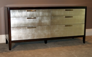 Walnut dresser with silver leaf drawers